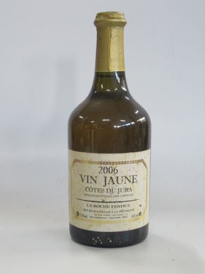 a bottle of wine that is sitting on a table