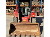 a picture of a tractor with a front end loader