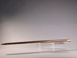 an image of a sword on display on a table