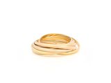 a close up of a gold ring on a white background