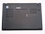 a black laptop that is sitting on a white table