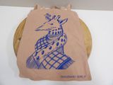 a tote bag with a drawing of a giraffe on it