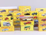 a lot of toy cars that are sitting on a table