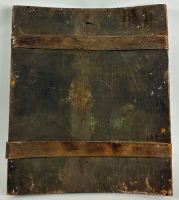 an old wooden box sitting on top of a table next to a white wall