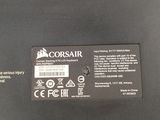 the back of a laptop computer with a cord connected to it