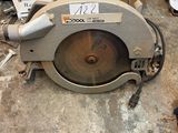 a picture of a circular saw sitting on the floor