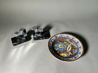 a small plate with a small bowl on it next to a small plate with a small bowl on it