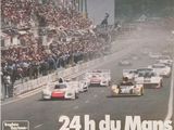 a poster of a race with cars going down the track