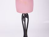 an image of a lamp with a pink glass shade on it
