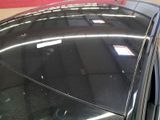 a car that has a sticker on the hood of it