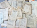 a pile of old books sitting on a table