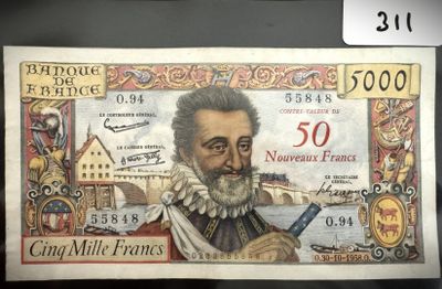 un ancien billet de banque sur lequel figure l'image d'un homme tenant une pipe