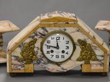 a clock that is sitting on top of a table