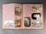 an open book with pictures of people and flowers on it
