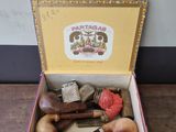 a box with a variety of items in it on a table
