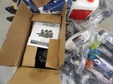 a box of toothbrushes sitting on a table next to a bottle of toothpaste