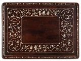 a wooden tray with a floral design on it