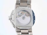 a close up of a watch on a white background