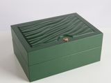 an image of a green box on a white surface