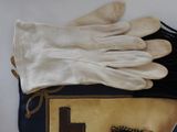 a bag with a pair of gloves and a chain on it