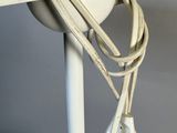 a white object with a cord attached to it