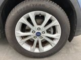 a close up view of a tire on a car