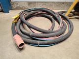 an image of a bunch of hoses laying on the ground