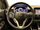 the interior of a car with a steering wheel and dashboard controls