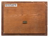 an old wooden box with a sticker on it
