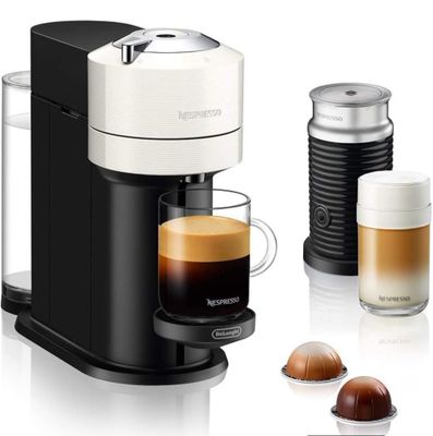an image of a coffee maker with a cup of coffee next to it