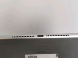 a close up of the back of a tablet with a barcode on it