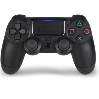 a close up of a game controller on a white surface