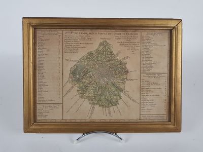 an old map of the city of london in a gold frame