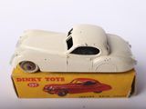 a toy car that is sitting on top of a box