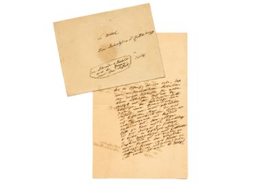 deux vieux papiers couverts d'écriture, posés l'un sur l'autre