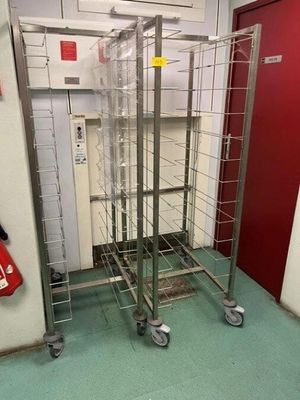 a metal rack that has a bunch of items on it