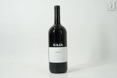 a bottle of wine that is sitting on the table