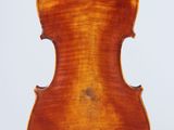 an old violin with a wooden back and a long neck