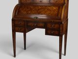 an antique writing desk with drawers and drawers on top of it