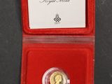 a red box with a gold coin inside of it