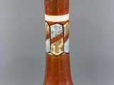 a vase that has a design on the inside of it