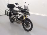 a picture of a motorcycle parked in a room