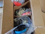 a cardboard box with a bunch of items in it