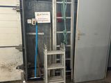 an image of a room that has a ladder and a ladder in it