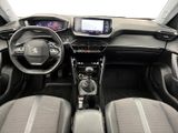 the interior of a car with a steering wheel and a dash panel