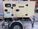 a small generator on a trailer in a warehouse