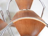 three chairs that are sitting next to each other