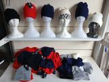 many hats on display on a shelf in a store