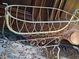 a baby carriage that is sitting on a rug