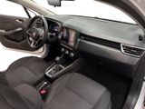 the interior of a car with a steering wheel, dashboard, and dashboard controls